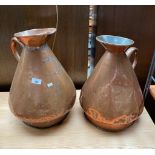 Two Large Four and Three Gallon copper jugs.