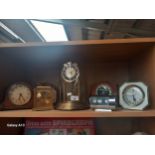 A lot of Seven Clocks to include Dome Glass mantle Clock with German Movement, most is working