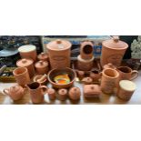 Large collection of The Original Suffolk Terracotta storage pots and preserves.