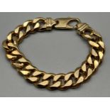 Heavy 9ct yellow gold curb bracelet. [23cm in length] [100.34grams]