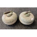 A Pair of Antique Curling stone with fitted matching handles.