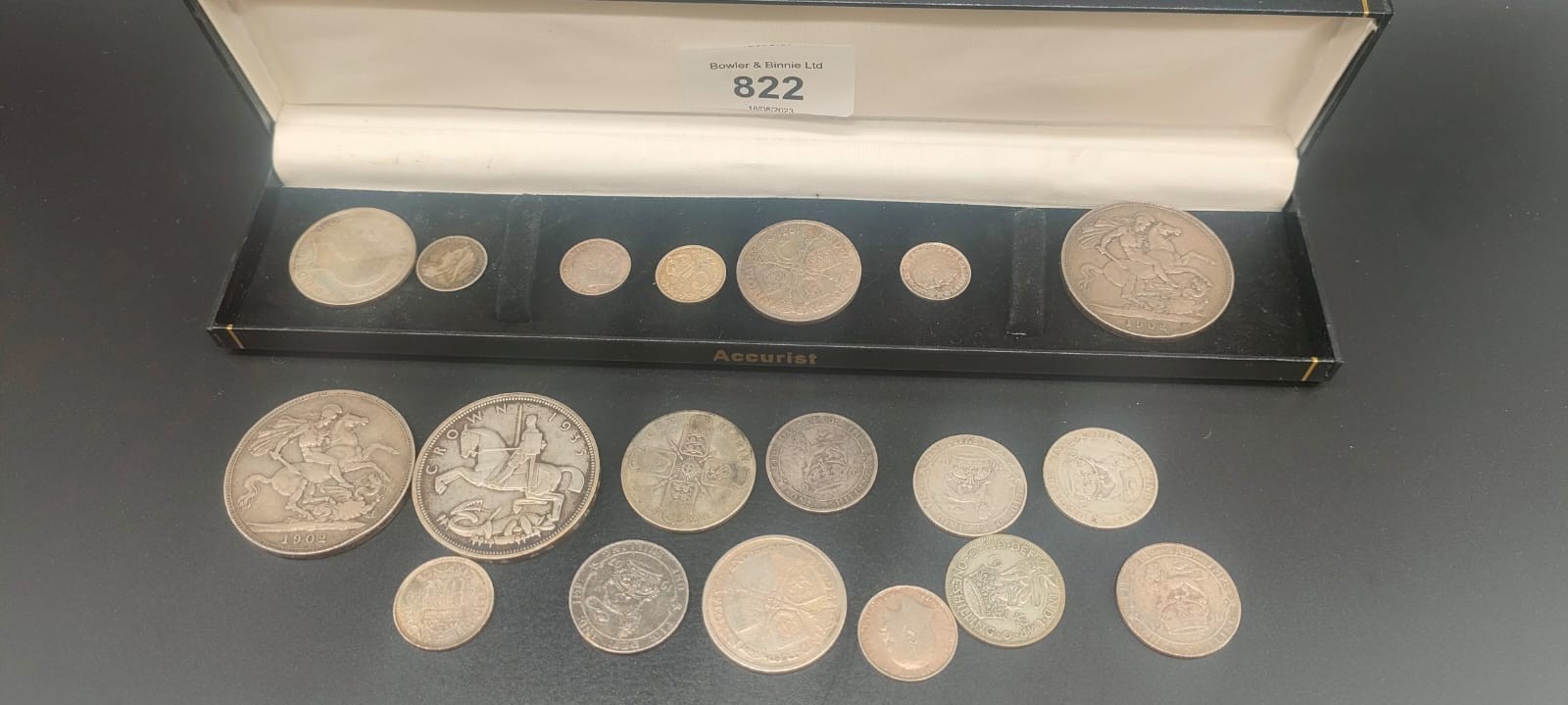 A Collection of Silver George V Silver crowns and one florins; Two 1902 and 1935 crowns.