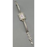 925 Silver and CZ stone ladies watch by Elizabeth Emanuel. Has a mother of pearl dial.