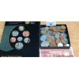 A Box of mixed world coins. Includes 1937 silver three pence and the Royal Mint United Kingdom