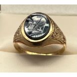 9ct yellow gold gents signet ring, engraved centurion stone. [Ring size S] [4.19Grams]