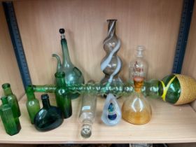 A Shelf of collectables glass bottles and art glass; Pyrex glass rolling pin and ornate cut glass