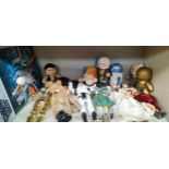 Shelf of 12" Star Wars figures, Mighty Muggs Star Wars figures and Sign