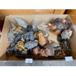A box of far eastern items to include; stone figurines, busts, and carved display pieces, Buddha