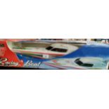 Radio controlled racing boat model