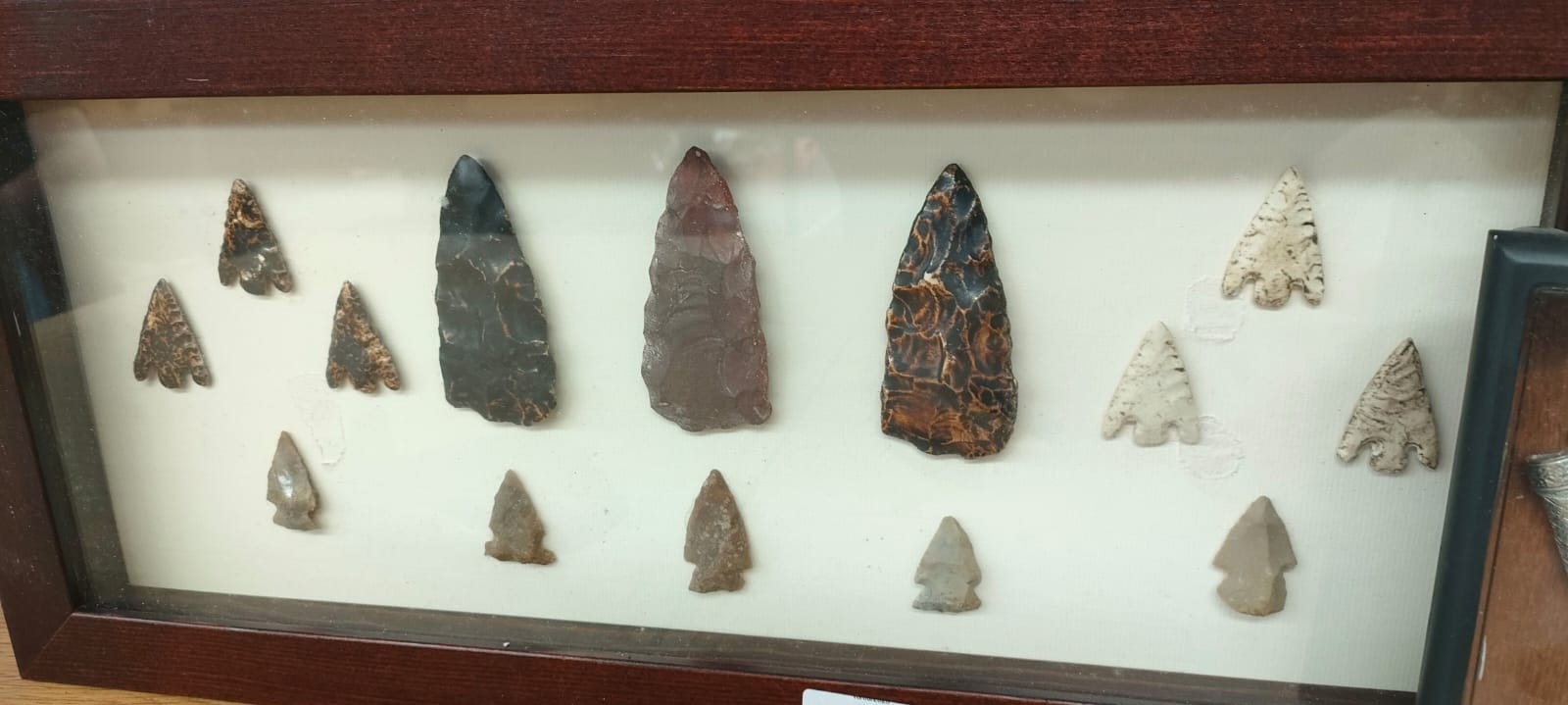 Framed Obsidian and stone arrow and spear heads, Framed Miniature eastern themed daggers, Mexico - Image 2 of 5