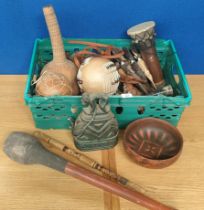 Box of Tribal instruments and tribal items; figures and lidded carved pot