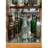 A collection of antique Dunfermline bottles to include names such as; [James Wilson] [Gilbert