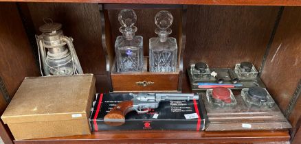 Shelf of collectables; Replica display revolver gun, Two antique ink well stands, Edinburgh