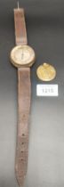 A Rare Aero Altimeter Compensated wrist piece with leather straps. Possibly WWI OR II. Together with