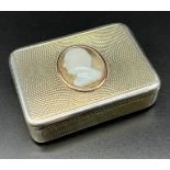 Georgian London Silver snuff box with fitted yellow metal, dome glass and cameo to the lid. Produced