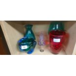 Shelf of art glass, White Friars red vase, Bohemian blue and green vase and various odds