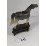 Antique Chinese carved jade horse sculpture sat upon a carved wooden base. [10x12x3cm]