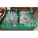 Two crates of quality crystal; Facet cut crystal sherry glasses with Cockerel motifs engraved with