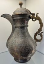 Early 19th century Bukhara or Turkestan coffee pot, copper worked and brass worked handle. [37cm