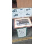 Three framed vintage car advertisement