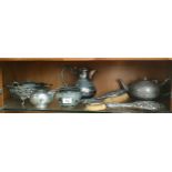 A Shelf of silver plated and silver items; Silver hand brush and mirror.