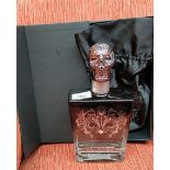 A bottle of Satryna tequila blanco within presentation box