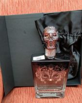 A bottle of Satryna tequila blanco within presentation box