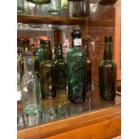 A collection of antique Dunfermline bottles to include names such as; [Robert Douglas] [James