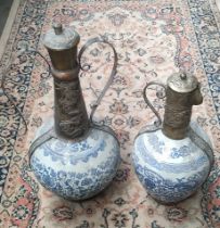 Two Chinese blue and white and metal worked vessel pots with lids.