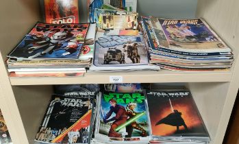 Two shelves of Star Wars annuals; Star Wars Insider