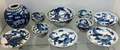 Selection of Antique Chinese blue and white dragon design cups and saucers, matching bowl, one other