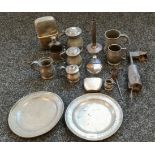 A Collection of antique and vintage pewter wares; measures, dinner plates and odd items.