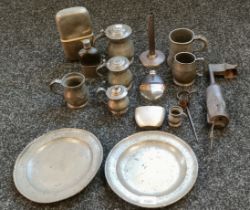A Collection of antique and vintage pewter wares; measures, dinner plates and odd items.