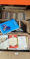 Four boxes of mixed genre books, maps and childrens annuals