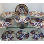 A Set of eight Chinese hand painted plates and two tazza comports. [Some have damage to rims- ask