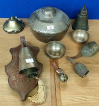 Collection of Singer bells and cow bells; Two Bronze three section cow bells, large brass ringing