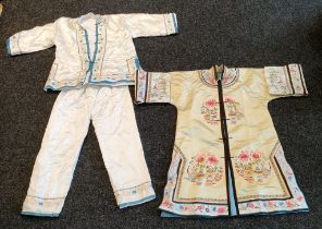Two Chinese items of clothing; Chinese Silk and embroidered tang shirt and a two piece silk and
