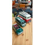 Two Tin plate VW Camper vans and one other