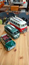 Two Tin plate VW Camper vans and one other