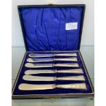 Boxed set of six Sheffield silver handle butter knives