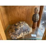 Tortoise shell together with item of interest- Tribal Voodoo style doll