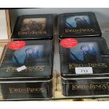Four boxes of Lord of the Rings trading cards