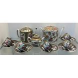 Chinese Famille Rose design hand painted Tea pots, cups and saucers. Three tea pots, five cups and