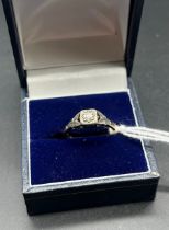 18ct and platinum diamond ring. [Ring size L] [2.78Grams]