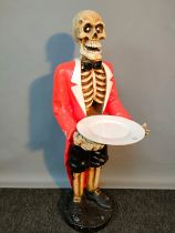 Hard plastic skeleton butler stand. [85.5cm high]