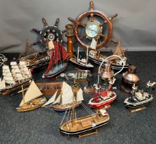 A Large collection of nautical items; Ship wheel clock, various galleon and trawler models and