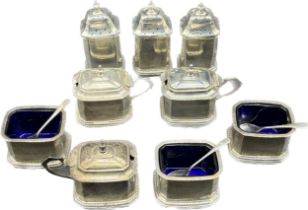 A Collection of Birmingham silver condiment items; Cruets, salt and mustard pots- comes with blue