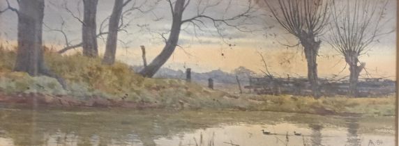 Watercolour depicting lake scene with trees, signed and dated to the right hand corner [Frame:27.