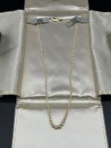 18ct yellow gold and natural pearl necklace- a single row graduating necklace of 239 pearls. comes