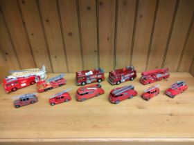 A selection of various dinky and match box fire engines